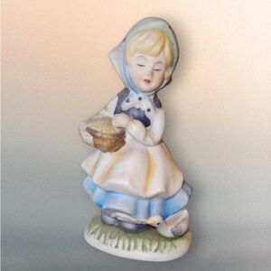 vintage girl with a goose biscuit Figurine statue